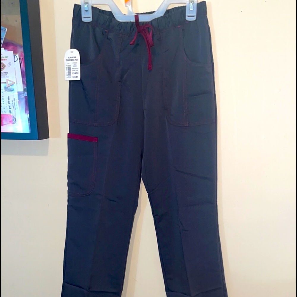 Brand new size XS stretchy cargo scrub pants and top